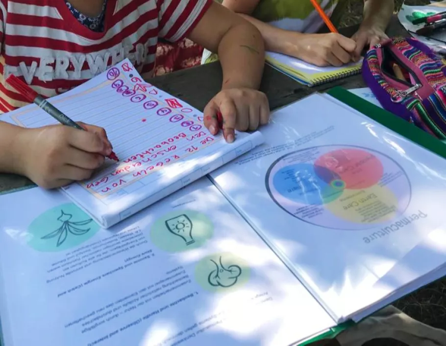 Children are learning about the principles of permaculture.